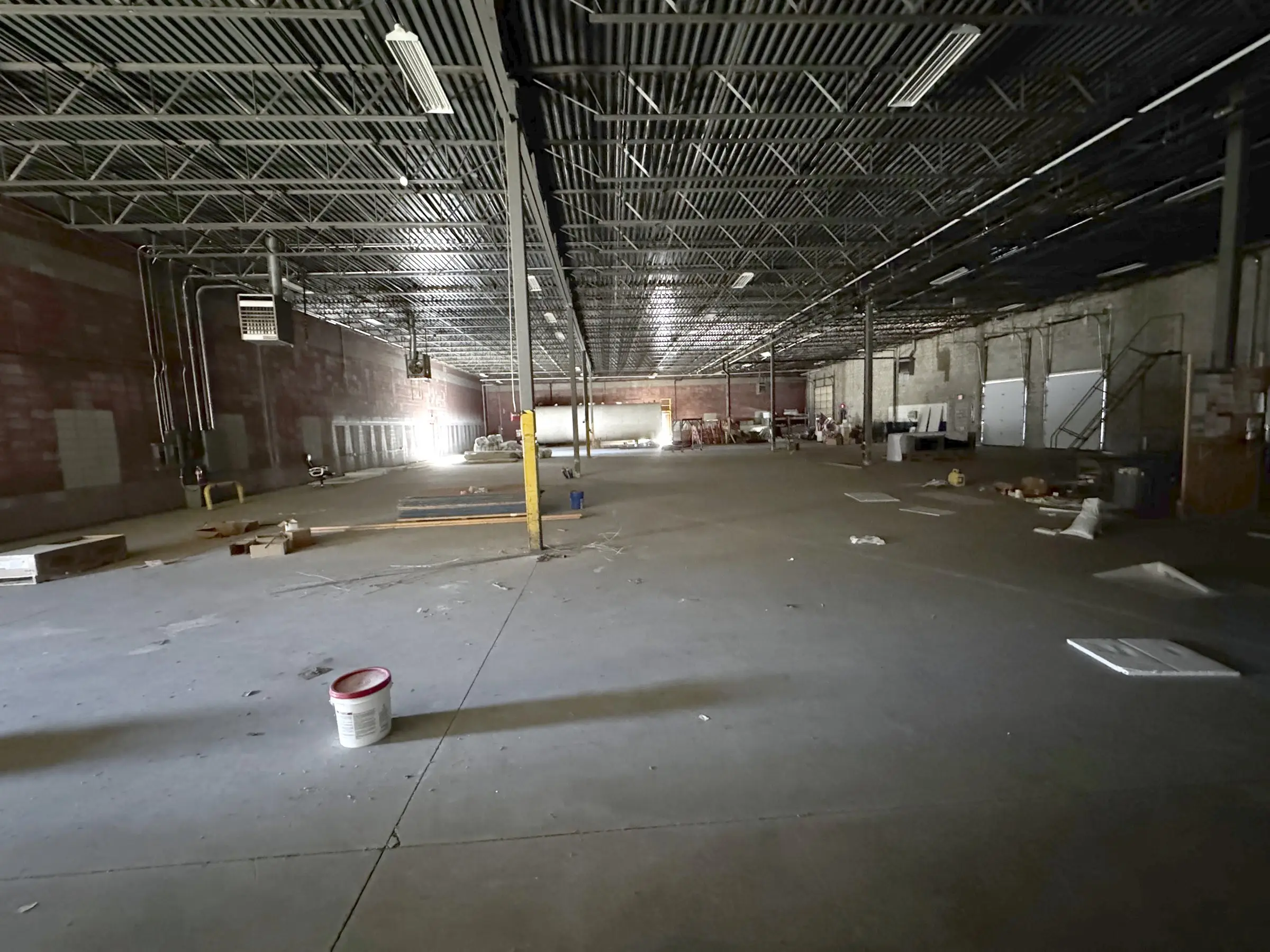 Warehouse interior looking toward the rear wall and loading doors
